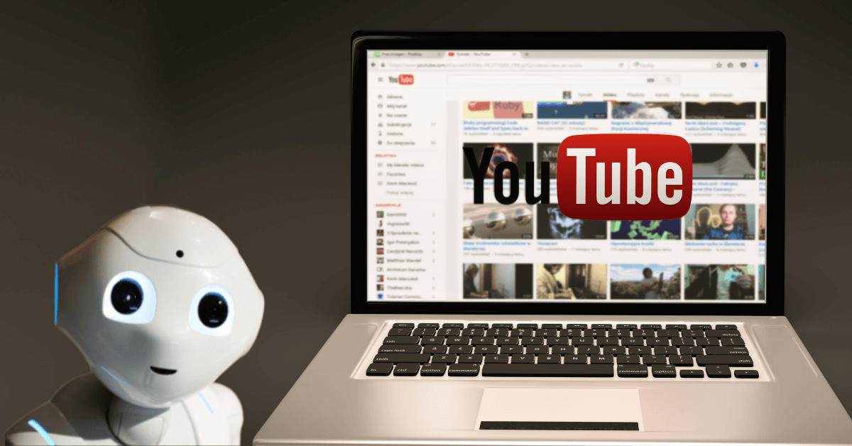 Robot with laptop showing YouTube